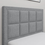 Close-up of the light grey upholstered headboard on the Single Ottoman Bed Frame, showcasing its modern square panel stitching design.