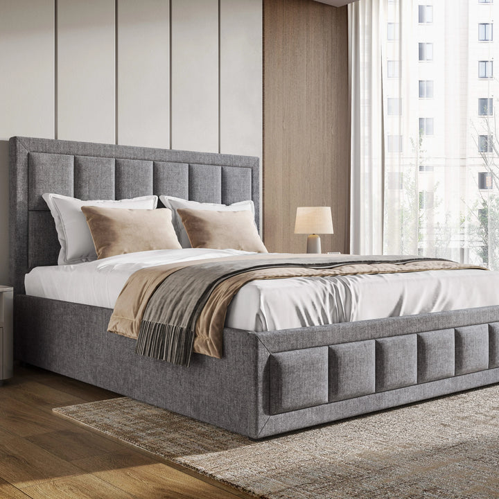 [Grey] Linen ottoman bed hero view, footboard storage panel visible and wood-panelled wall behind