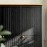 [Black] Linra wardrobe lower corner detail showing tapered painted leg under base drawer panel
