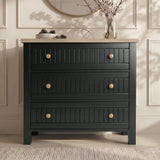 [Black] Linra bedroom furniture set chest, three stacked drawers in black finish beneath an oak-topped surface