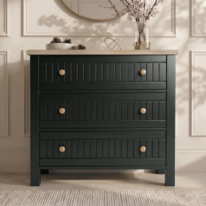 [Black] Linra bedroom furniture set chest, three stacked drawers in black finish beneath an oak-topped surface