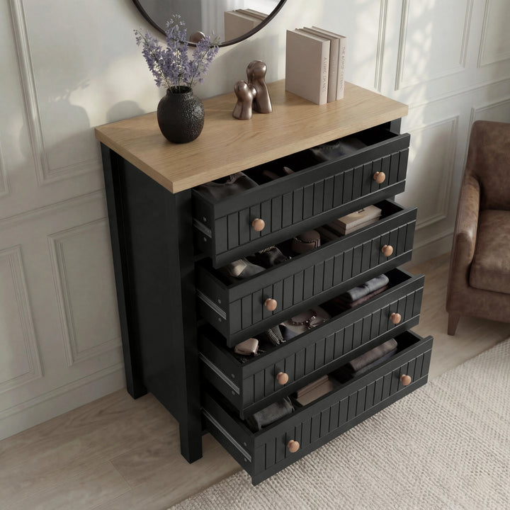 [Black] Linra bedroom furniture set chest of drawers pulled open, deep grooved drawers under an oak veneer top