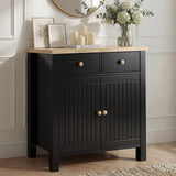 [Black] Linra 80cm sideboard front view in a styled room with plant and decorative objects on oak veneer top