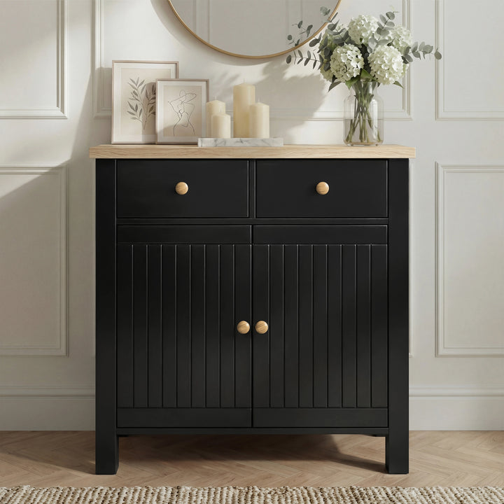[Black] Linra 80cm sideboard front view with two top drawers above two grooved cabinet doors and brass knobs