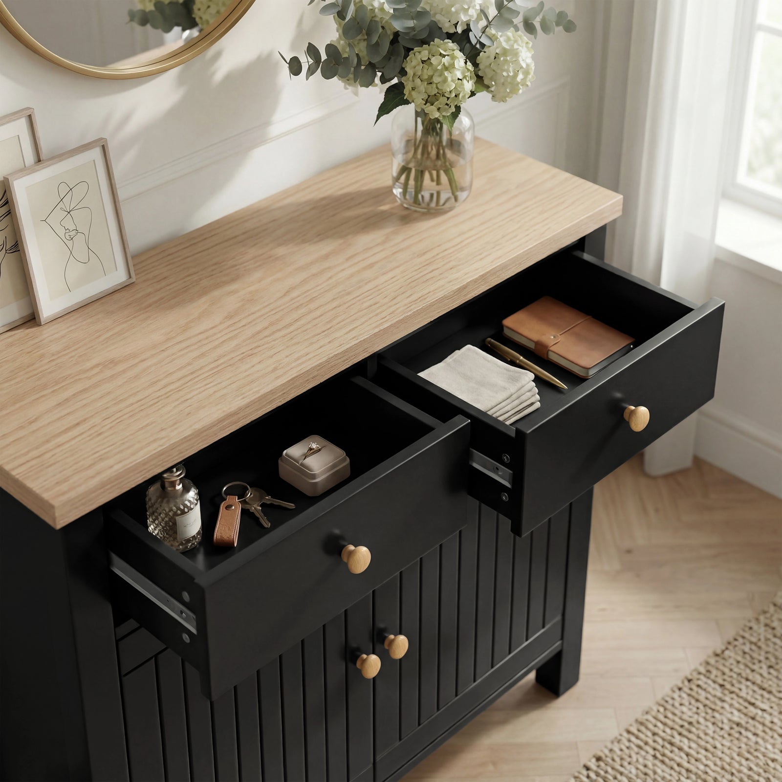 [Black] Linra sideboard angled top-down view, oak top dominates frame above two open black drawers