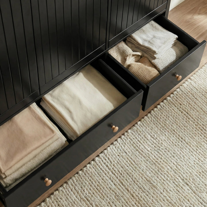 [Black] Linra wardrobe base drawer pulled open showing large interior space with folded garments stored inside
