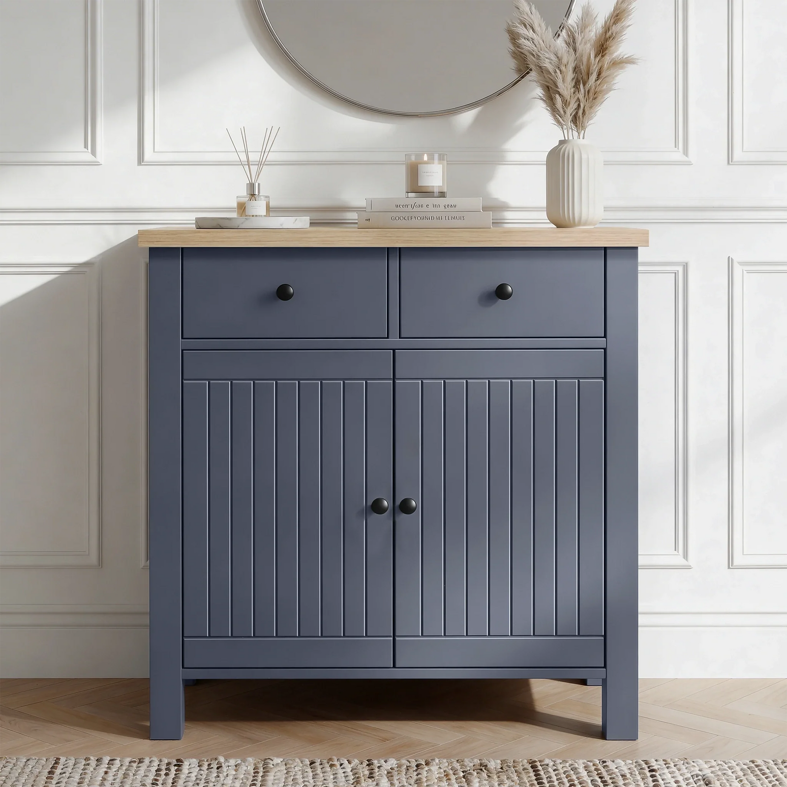 [Blue] Linra 80cm sideboard front view in a styled room with round mirror and decorative objects on oak veneer top