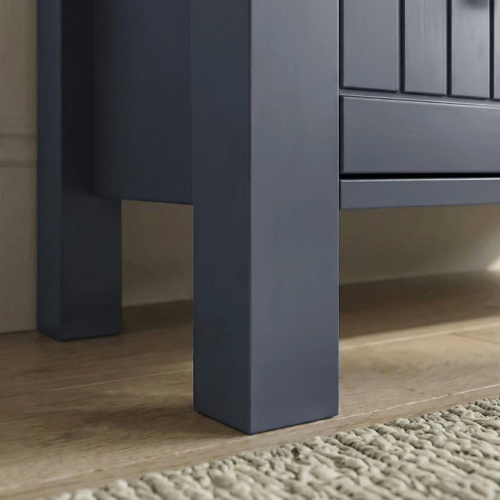 [Blue] Close-up Linra chest of drawers blue painted foot and lower frame meeting beaded drawer edge