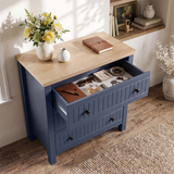[Blue] Linra chest of drawers with top drawer pulled open, showing folded clothing and storage