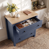 [Blue] Linra chest of drawers with top drawer pulled open, showing folded clothing and storage
