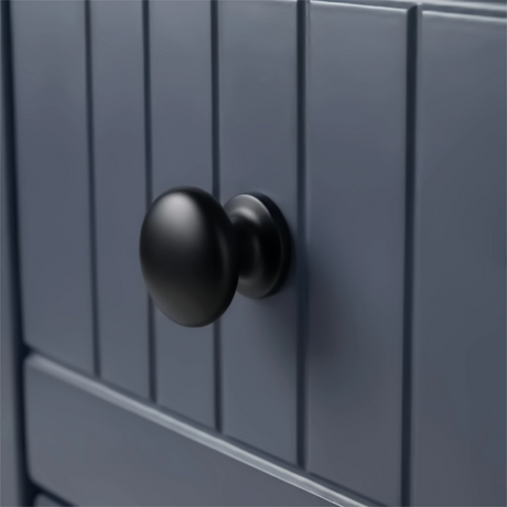 [Blue] Linra 4-drawer chest close-up of round solid black knob handle on a beaded panel painted drawer front