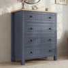 [Blue] Linra 4-drawer chest side angled view showing full height in a styled bedroom with mirror and books on top
