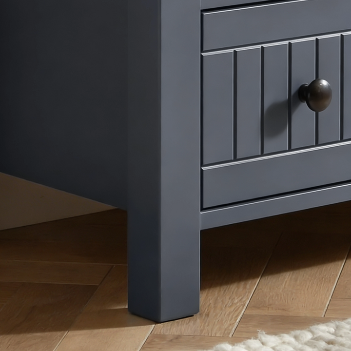 [Blue] Linra 5-drawer chest base corner with square tapered painted leg sat on herringbone parquet floor