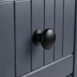 [Blue] Linra 5-drawer chest close-up of round solid black knob handle on a beaded panel painted drawer front