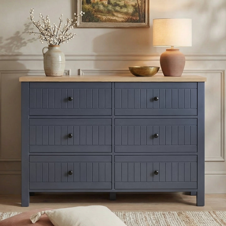 [Blue] Linra large 6 drawer chest in neutral room beside woven basket and floor cushions on rug