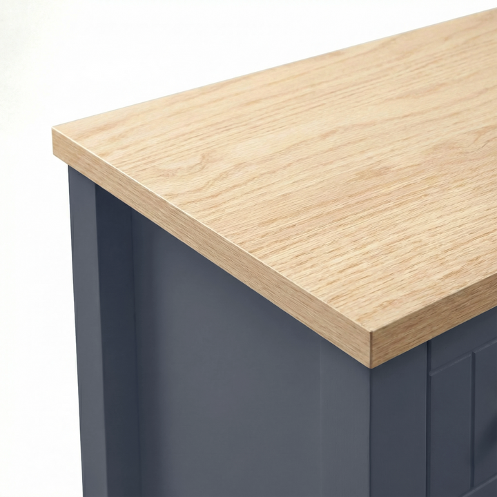[Blue] Linra large 6 drawer chest top-surface detail with chamfered front edge meeting painted side
