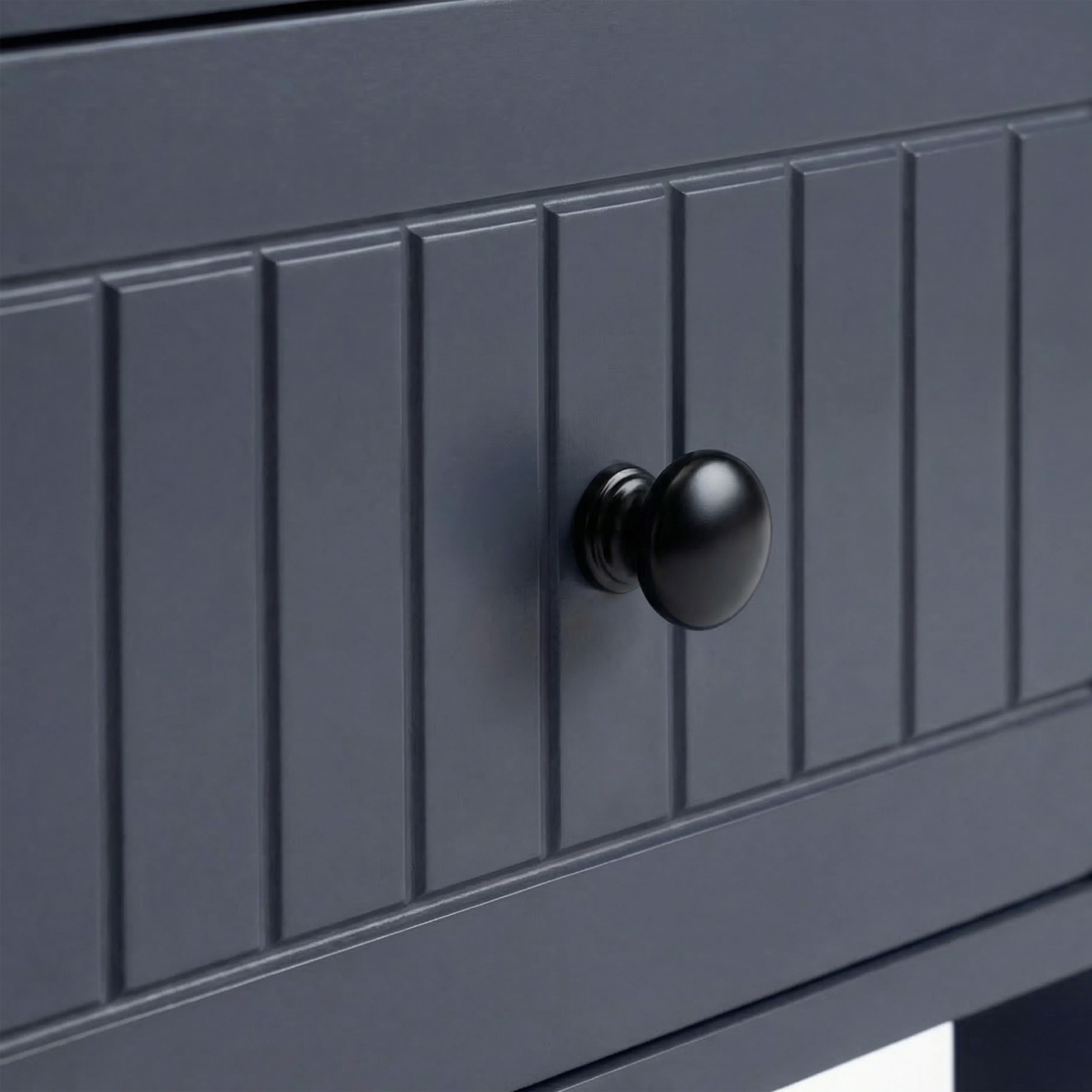 [Blue] Linra large 6 drawer chest macro of black knob centred on painted beaded drawer face