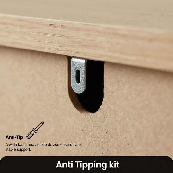 [Grey] Linra chest of drawers anti-tip metal bracket fitted to the underside with safety kit label below