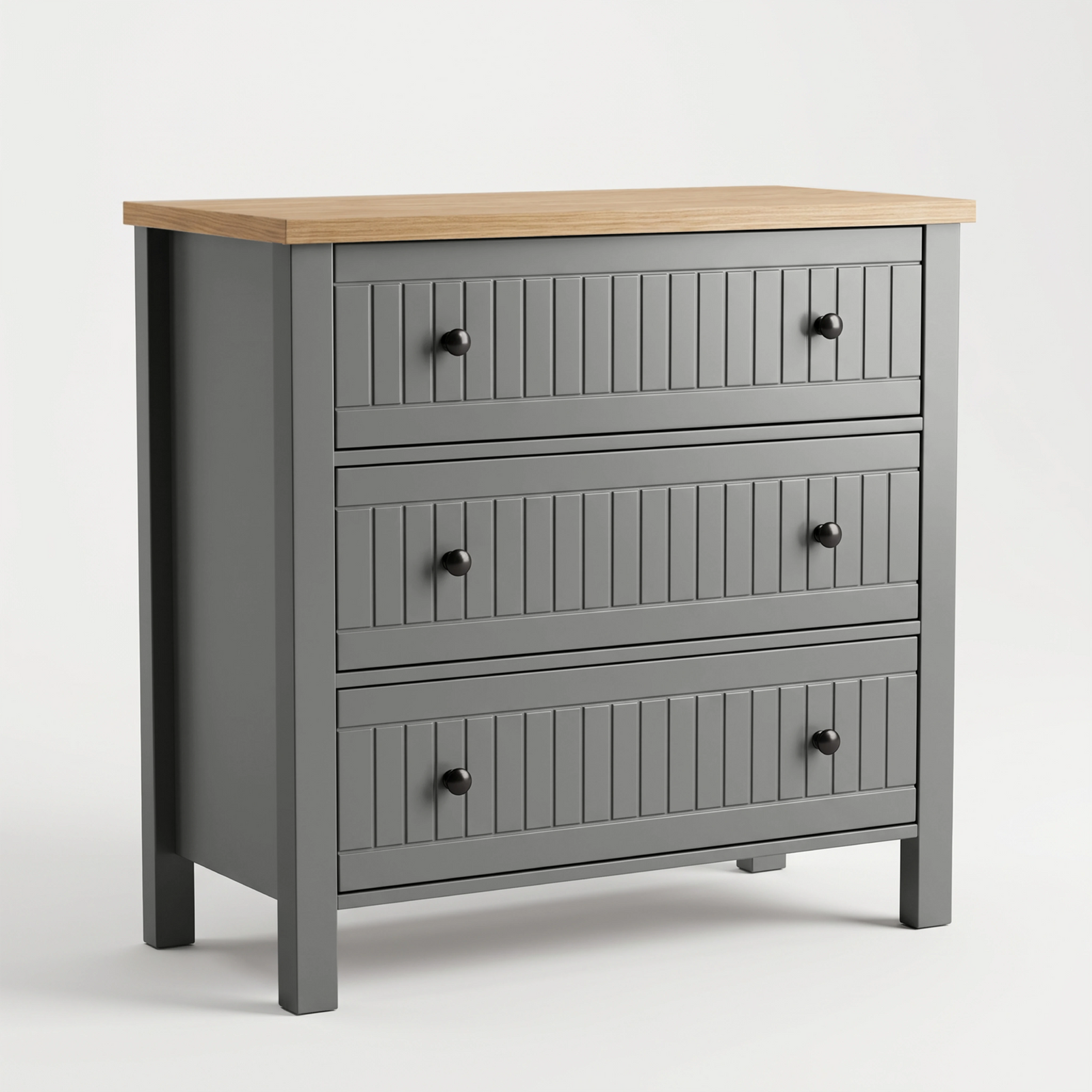 [Grey] A three-drawer chest of drawers with a grey painted body, a light natural wood top, and dark round knobs, shown on a clean white studio background.