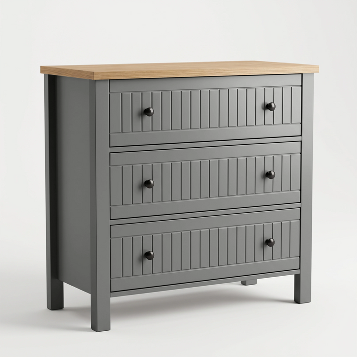 [Grey] A three-drawer chest of drawers with a grey painted body, a light natural wood top, and dark round knobs, shown on a clean white studio background.