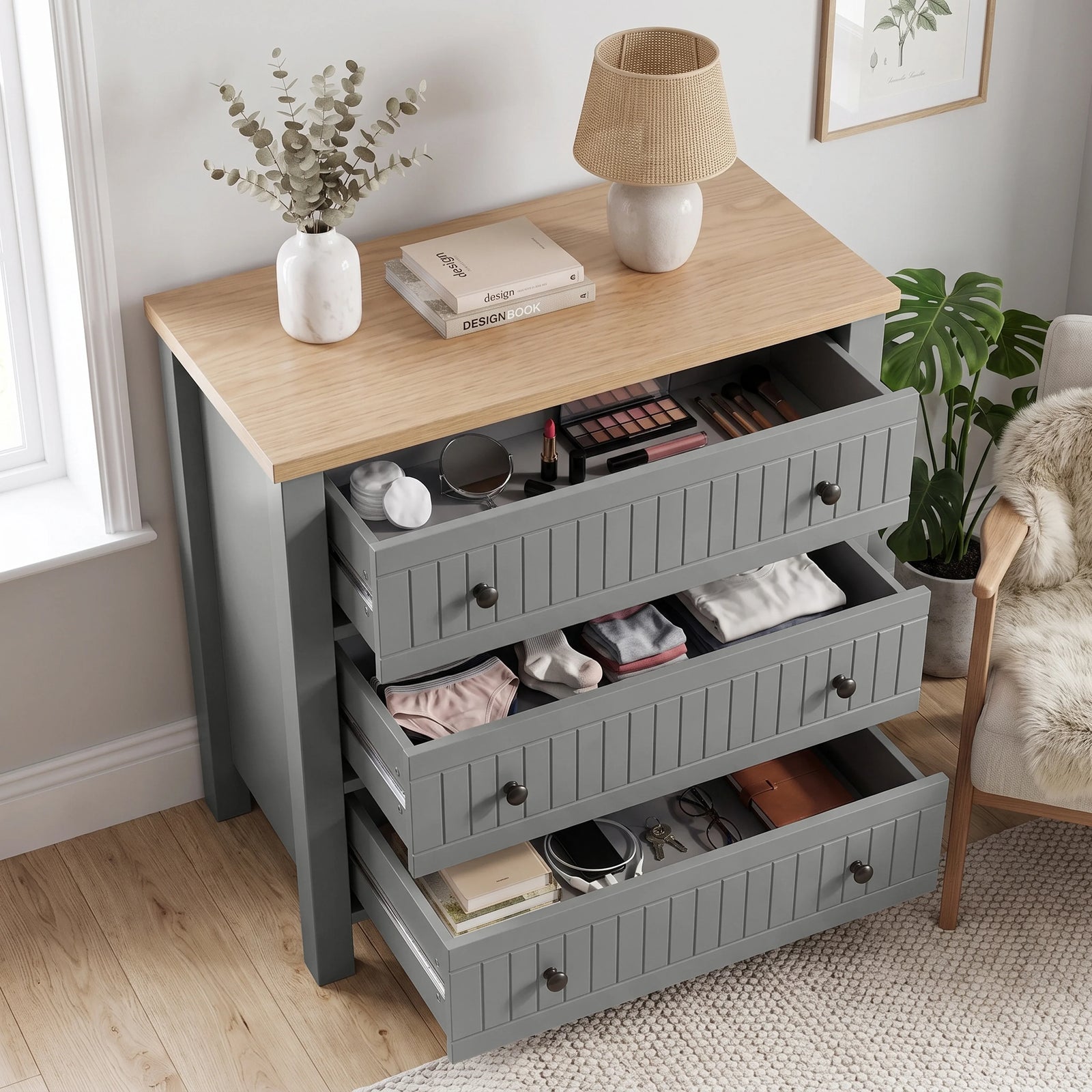 [Grey] Linra 3-drawer chest with all drawers open showing interior storage depth with feature annotation overlay