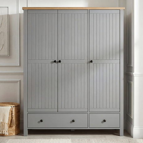 [Grey] Linra bedroom set 3-door wardrobe front view in a styled bedroom with lamp and decorative accessories