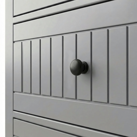 [Grey] Linra 6-drawer chest close-up of round solid black knob handle on a beaded panel painted drawer front