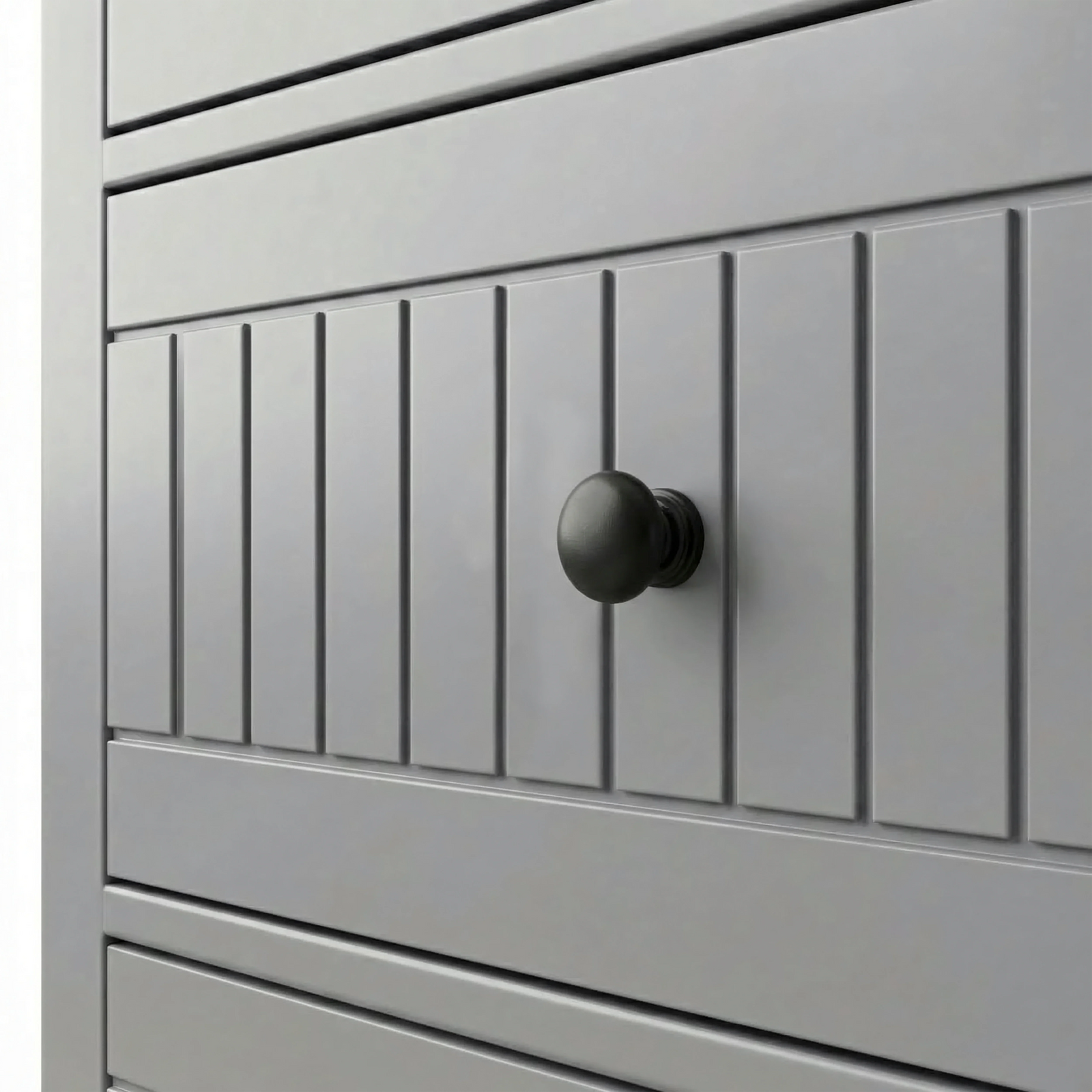 [Grey] Linra large 6 drawer chest detail of vertical groove panelling and circular black knob handle