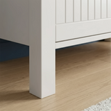 [White] Linra 135cm sideboard side profile view on plain background showing painted frame depth and leg detail