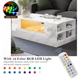 Living room with a white coffee table and LED light strip, featuring a remote control.