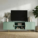Grey TV unit with fluted doors styled in a modern living room with decor, creating a contemporary home aesthetic.