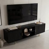 Long black TV unit with a wide top surface and fluted cabinets, ideal for large screens and modern living room storage.