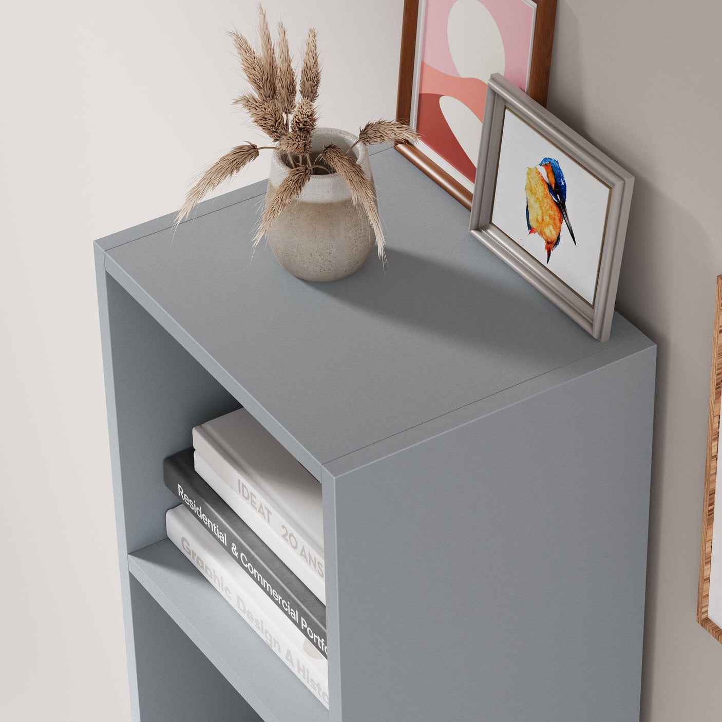 Top view of grey Blisswood bookcase with decorative items, perfect for modern home styling.