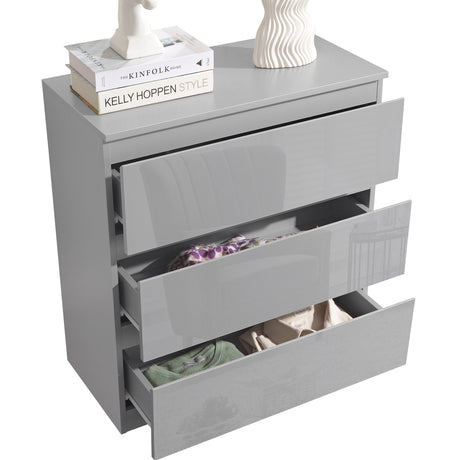 Low grey chest of drawers, providing efficient and stylish storage with a modern design.