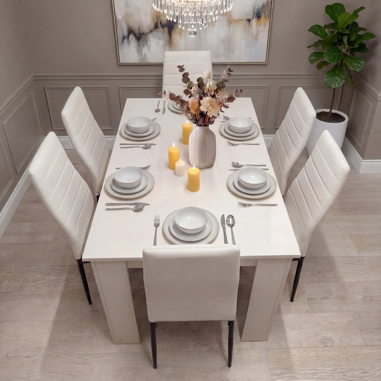 Elegant white dining table set for 6 with PU leather chairs and candles. A modern centerpiece for dining rooms or kitchen areas.