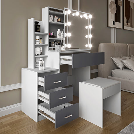 Makeup vanity with mirror and lights in a room setting