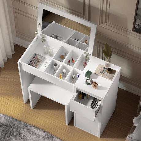 White makeup vanity table with mirror and storage compartments in a room.