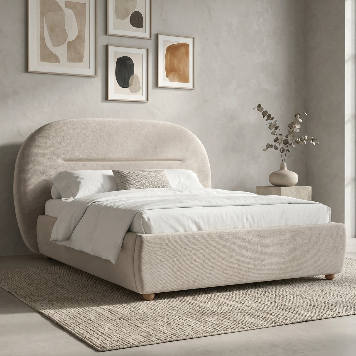 [Beige | King] Side angle showing curved headboard silhouette and padded base with white linen duvet and accent cushion