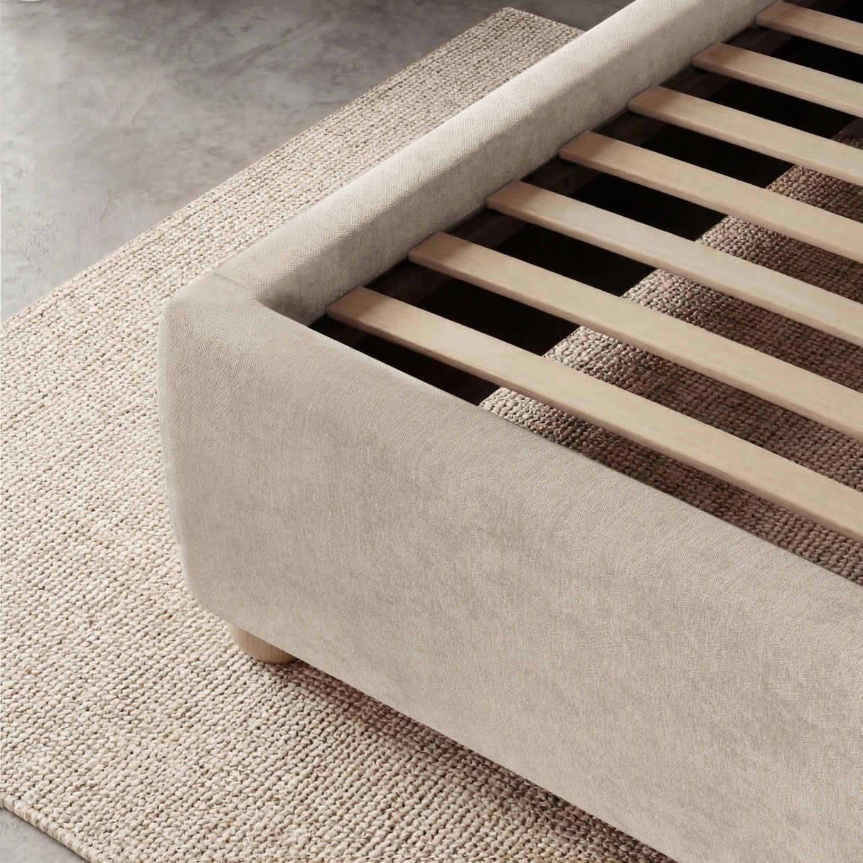[Beige | King] Close-up of mattress support showing parallel wooden slats fitted inside the padded frame base