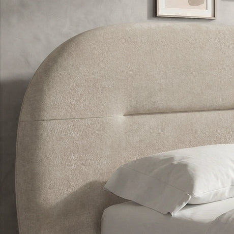 [Beige | King] Extreme close-up of upholstered headboard corner showing the rounded top edge and fabric grain detail