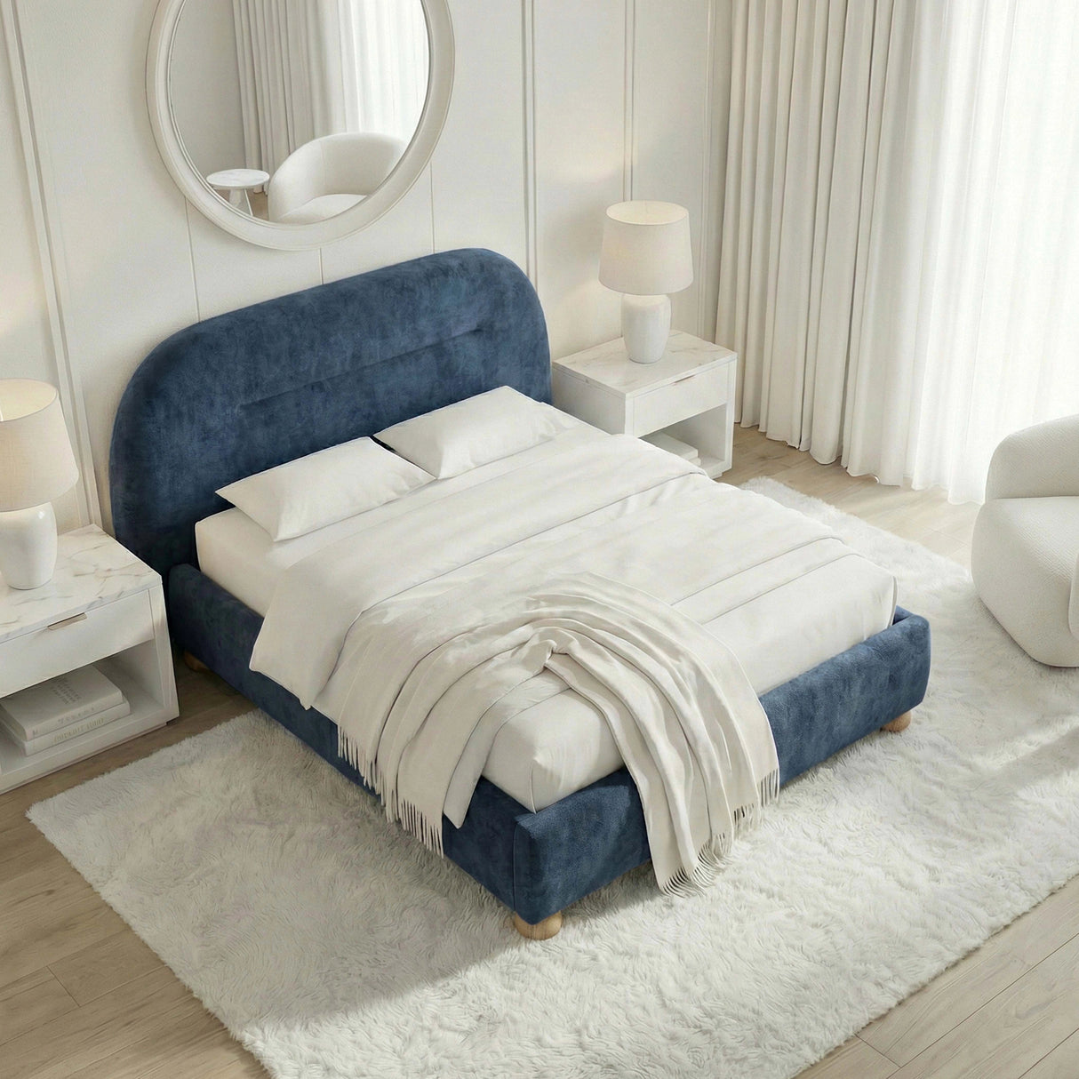[Blue | Double] Overhead corner view showing full velvet bed footprint with white bedding and fringed throw on cream rug