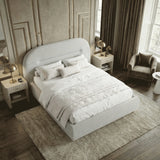 [Grey | Double] Overhead corner view showing full bed with textured white duvet and cushions on shag rug in art deco room