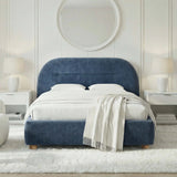 [Blue | King] Arch headboard bed frame dressed with white bedding below large circular mirror on panelled accent wall