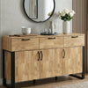 [Mango Wood Effect] Ironmere sideboard front view with three drawers, three doors, round mirror, vase, bowl, and flowers.