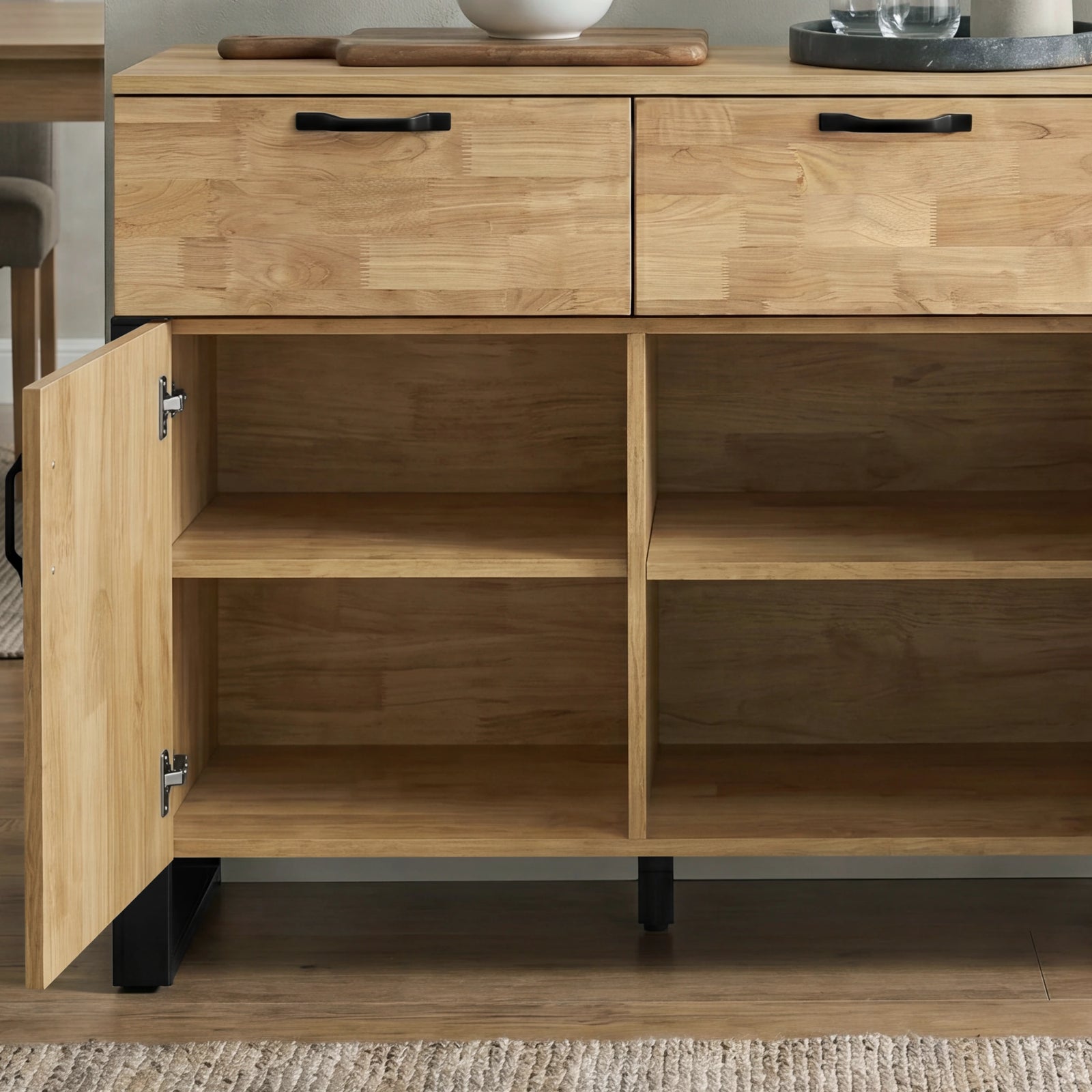[Mango Wood Effect] Ironmere sideboard close-up showing open shelves, drawer fronts, black legs, and visible door hinge.