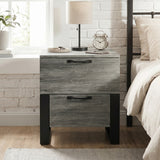 [Wooden Grey] Millwright industrial 2 drawer bedside table with black legs shown beside a bed