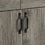 [Wooden Grey] Millwright sideboard close-up showing black angular handles on wooden grey doors
