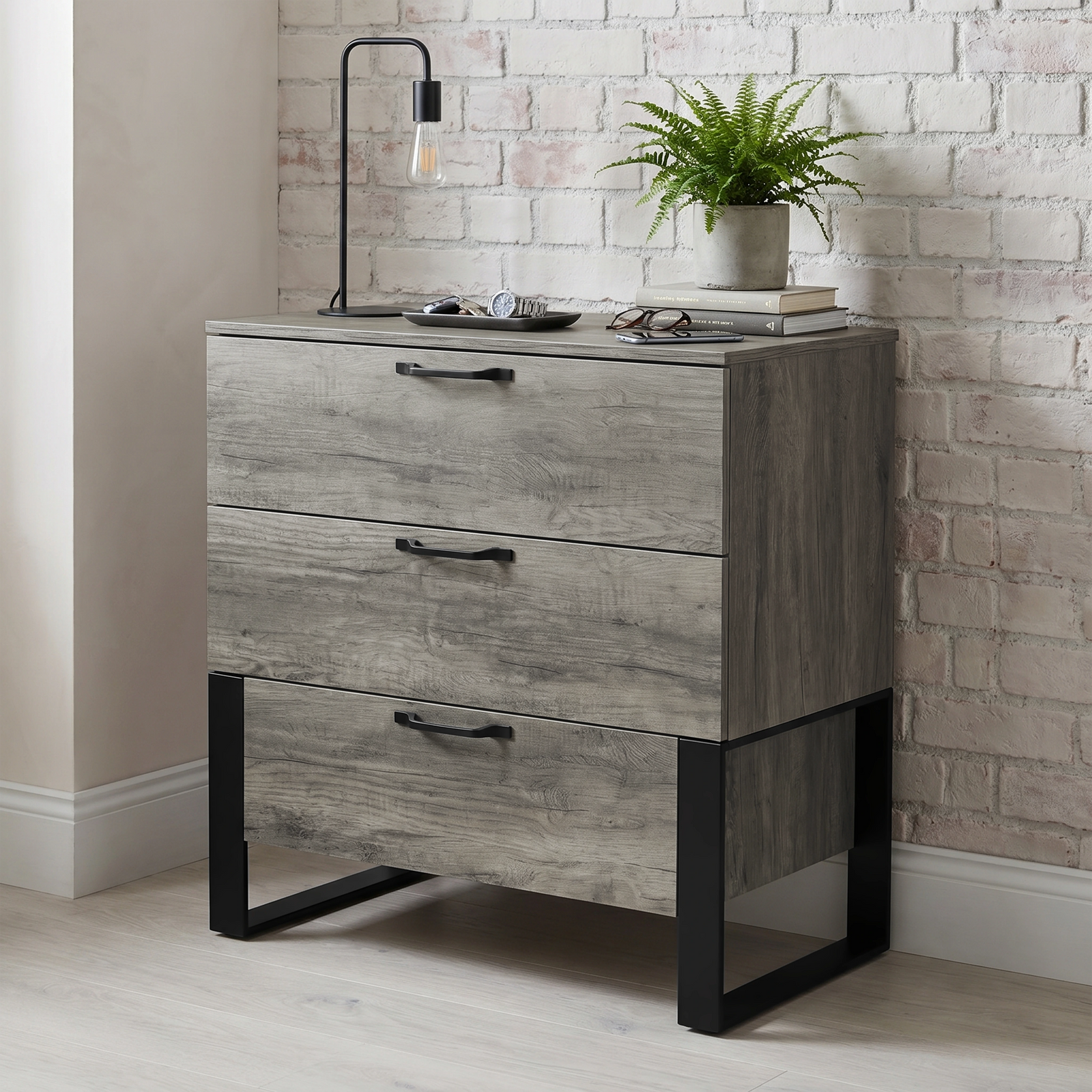 [Wooden Grey] Millwright industrial 3 drawer chest of drawers in an angled room view with decor