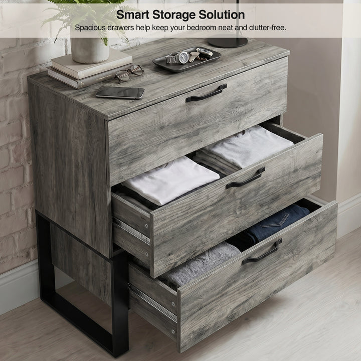 [Wooden Grey] Millwright 3 drawer chest of drawers with all drawers open showing folded clothes storage