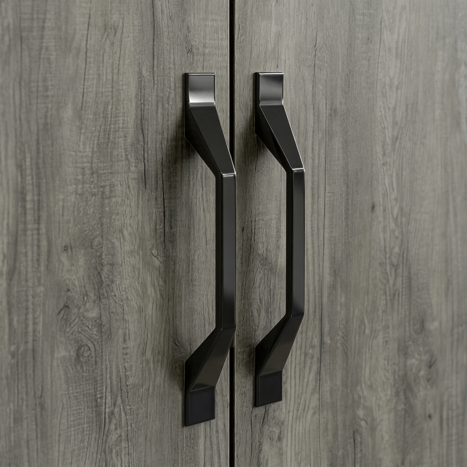 [Wooden Grey] Millwright wardrobe close-up showing black angular handles on wooden grey doors